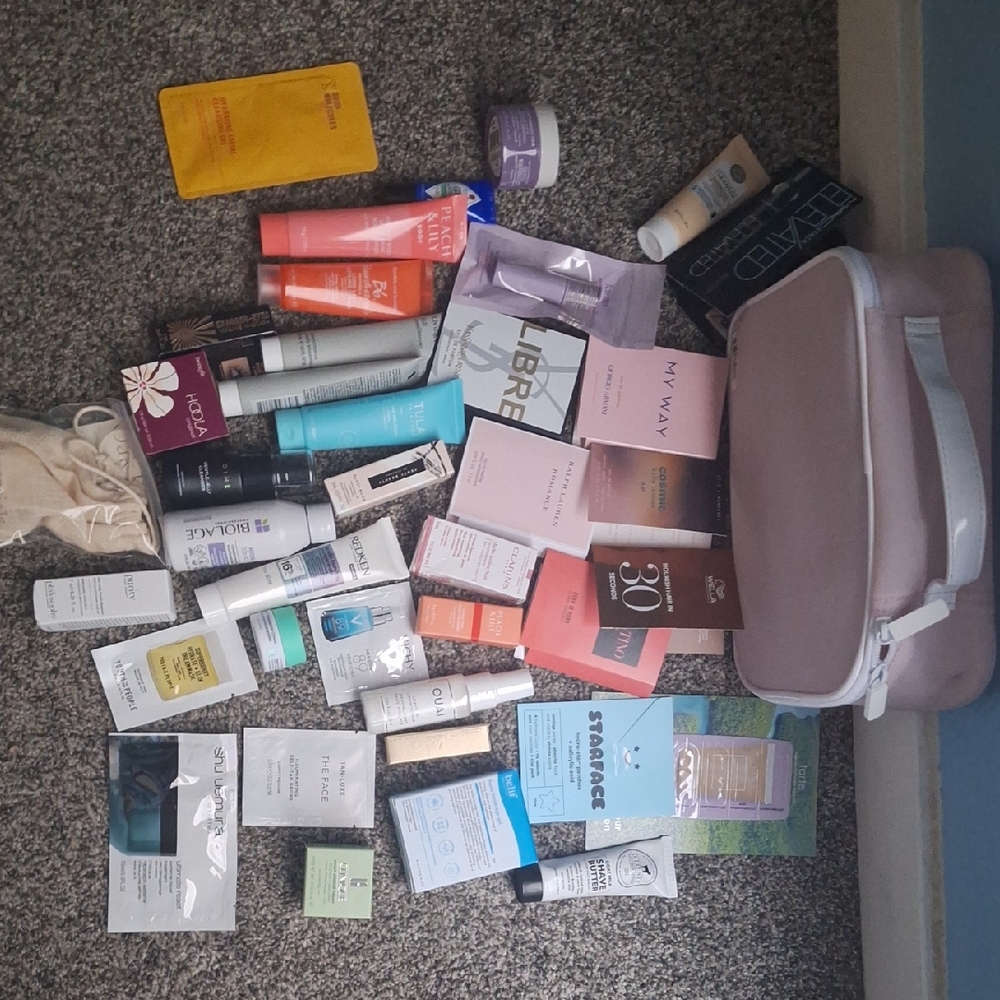 Assorted Skincare and Beauty Samples with Pink Bag